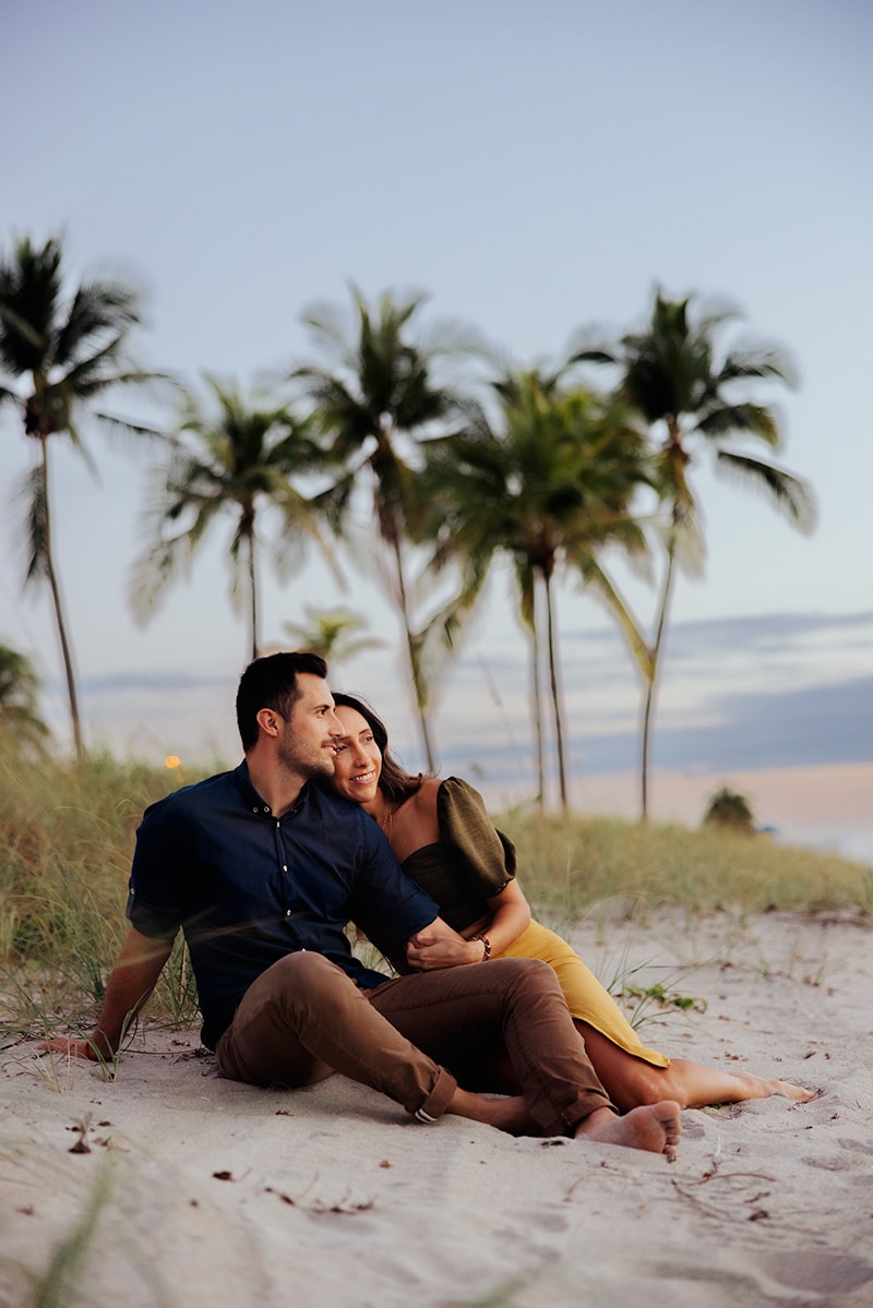 couple cuddling beach sunrise photos