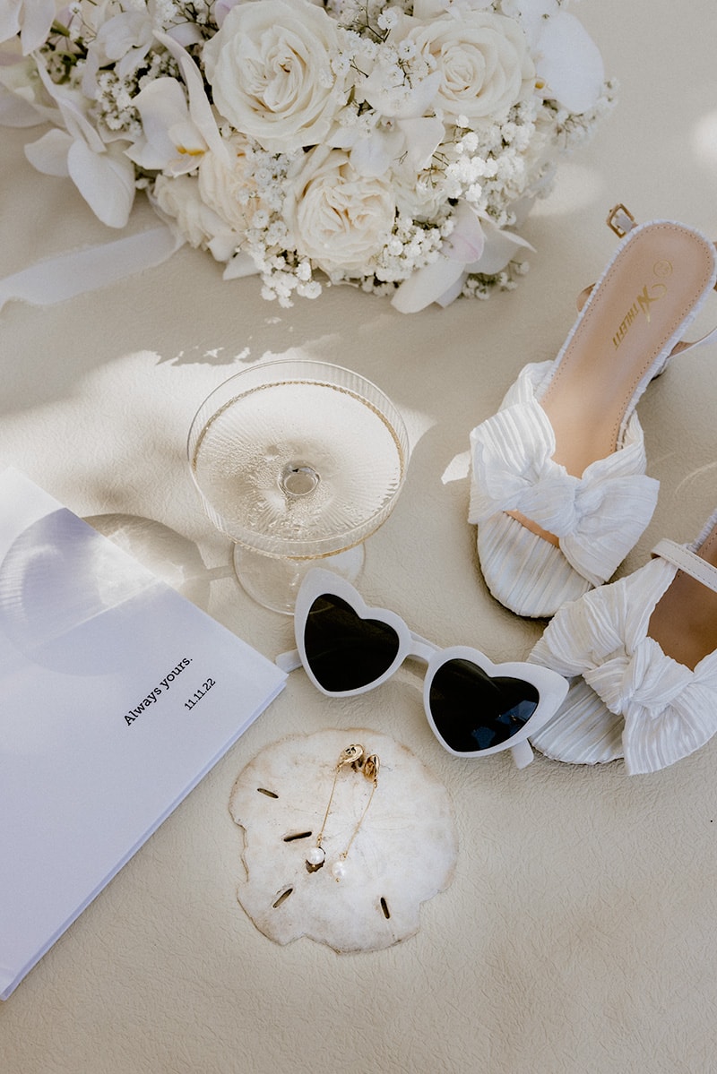 bridal accessories, wihte shoes, sunglasses, pearl earrings