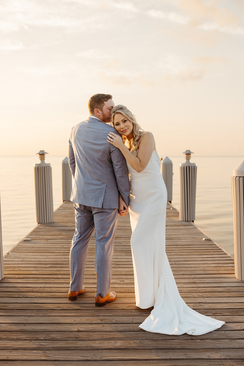 bride, white dress, groom, blue suit, sunrise, pier